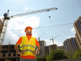Young man civil engineer in safety hat