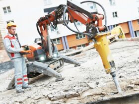 Professional asbestos inspector examining a residential property for asbestos safety