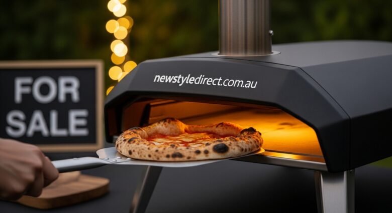 Portable pizza oven being used for home pizza making in an outdoor kitchen setting