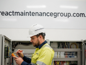 Commercial electrician inspecting electrical systems to improve business safety and operational efficiency