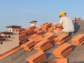 Professional roof replacement service installing new roofing materials on a residential home